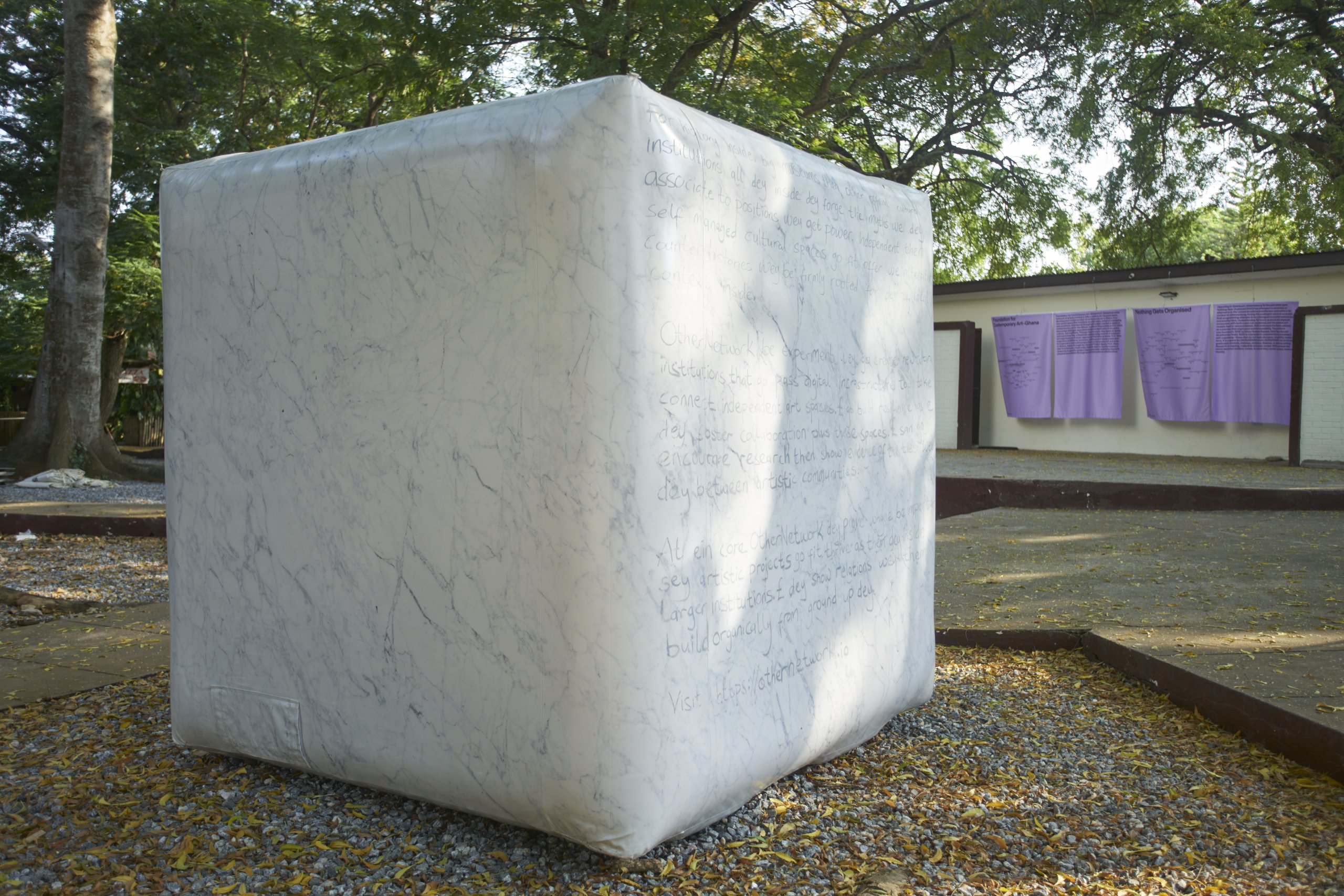 Image of OtherNetwork installation at Foundation for Contemporary Art-Ghana in November 2022, with a portion of the text translated into Pidgin English. Photo: Nii Odzenma