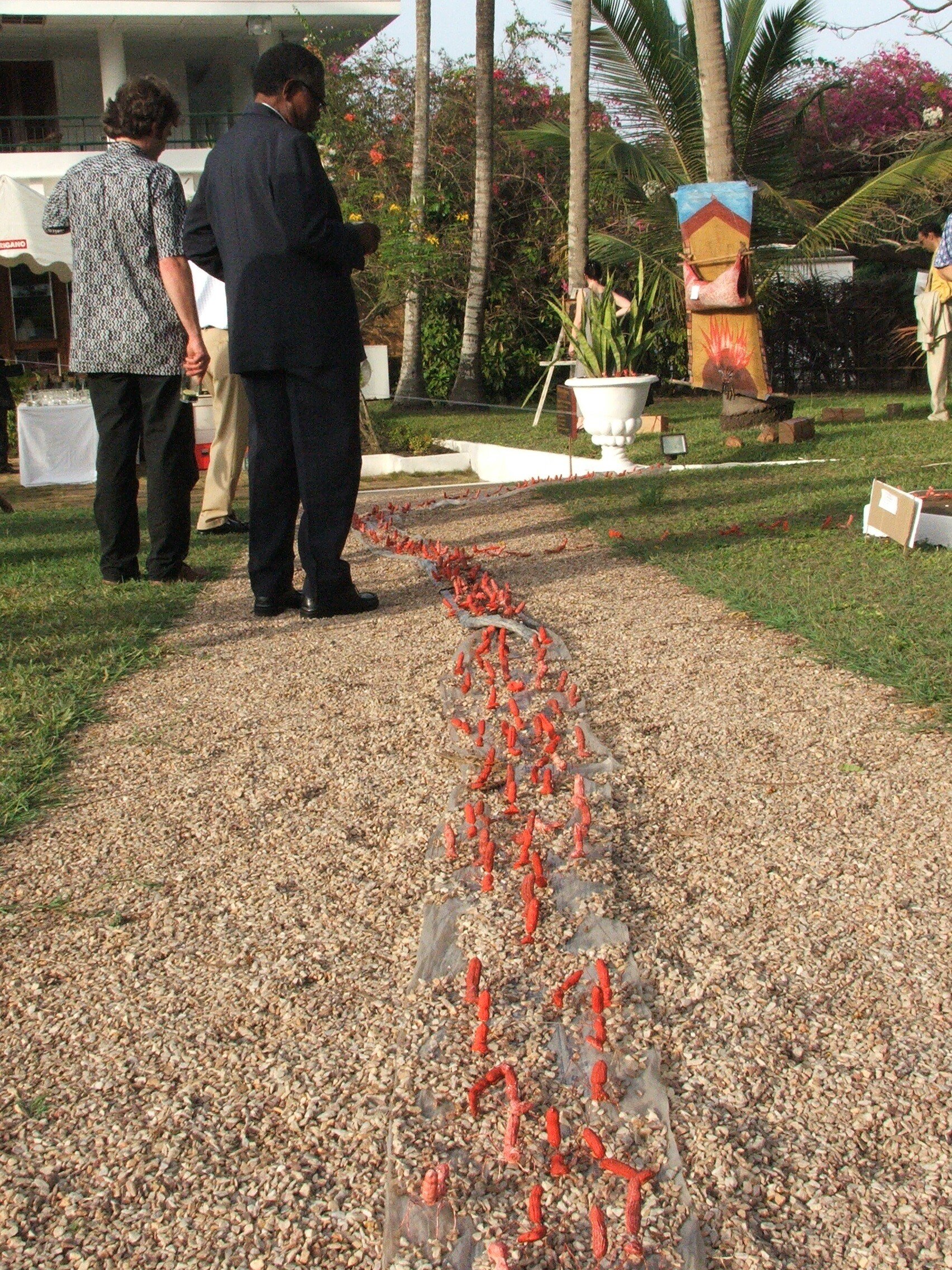 Installation (left) by Olaniyi Rasheed Akindiya (Akirash) and (right) Kofi Dawson as part of “Art in the Garden,” 2006. Photo: FCA-GH Archives.