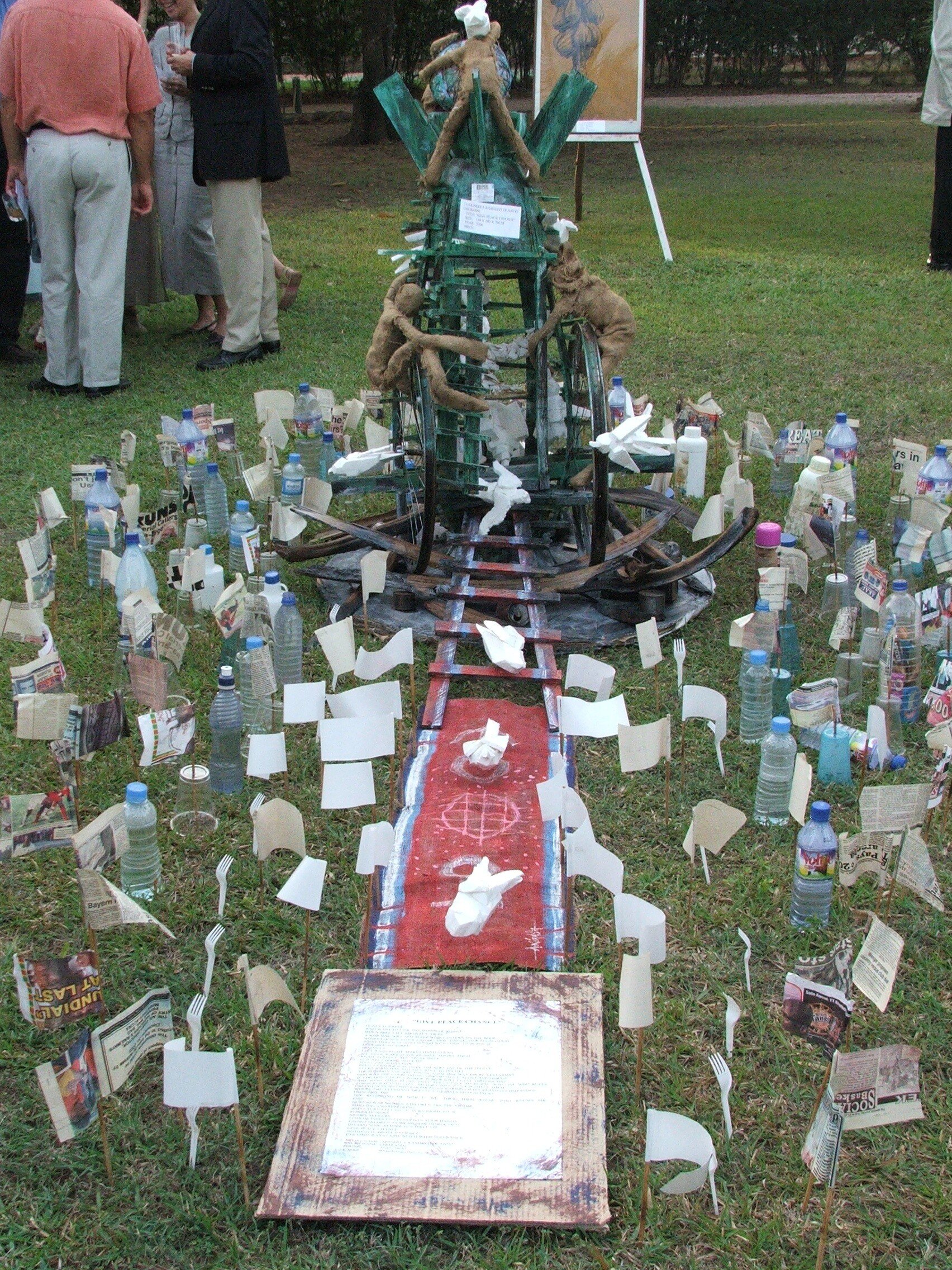 Installation (left) by Olaniyi Rasheed Akindiya (Akirash) and (right) Kofi Dawson as part of “Art in the Garden,” 2006. Photo: FCA-GH Archives.